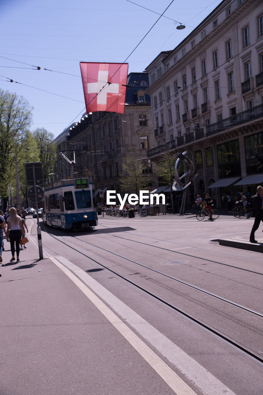 STREET AMIDST BUILDINGS IN CITY