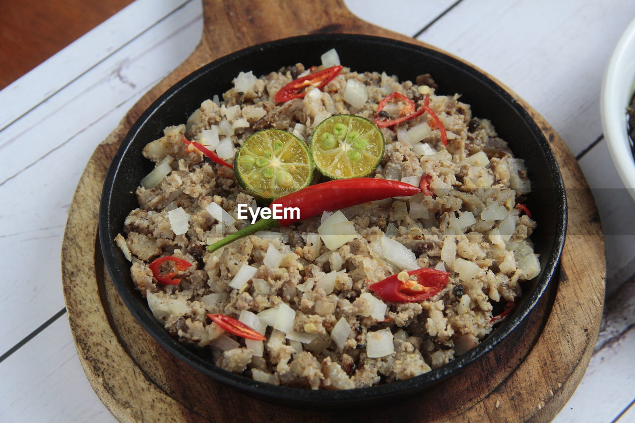 Photo of freshly cooked filipino food called pork sisig.