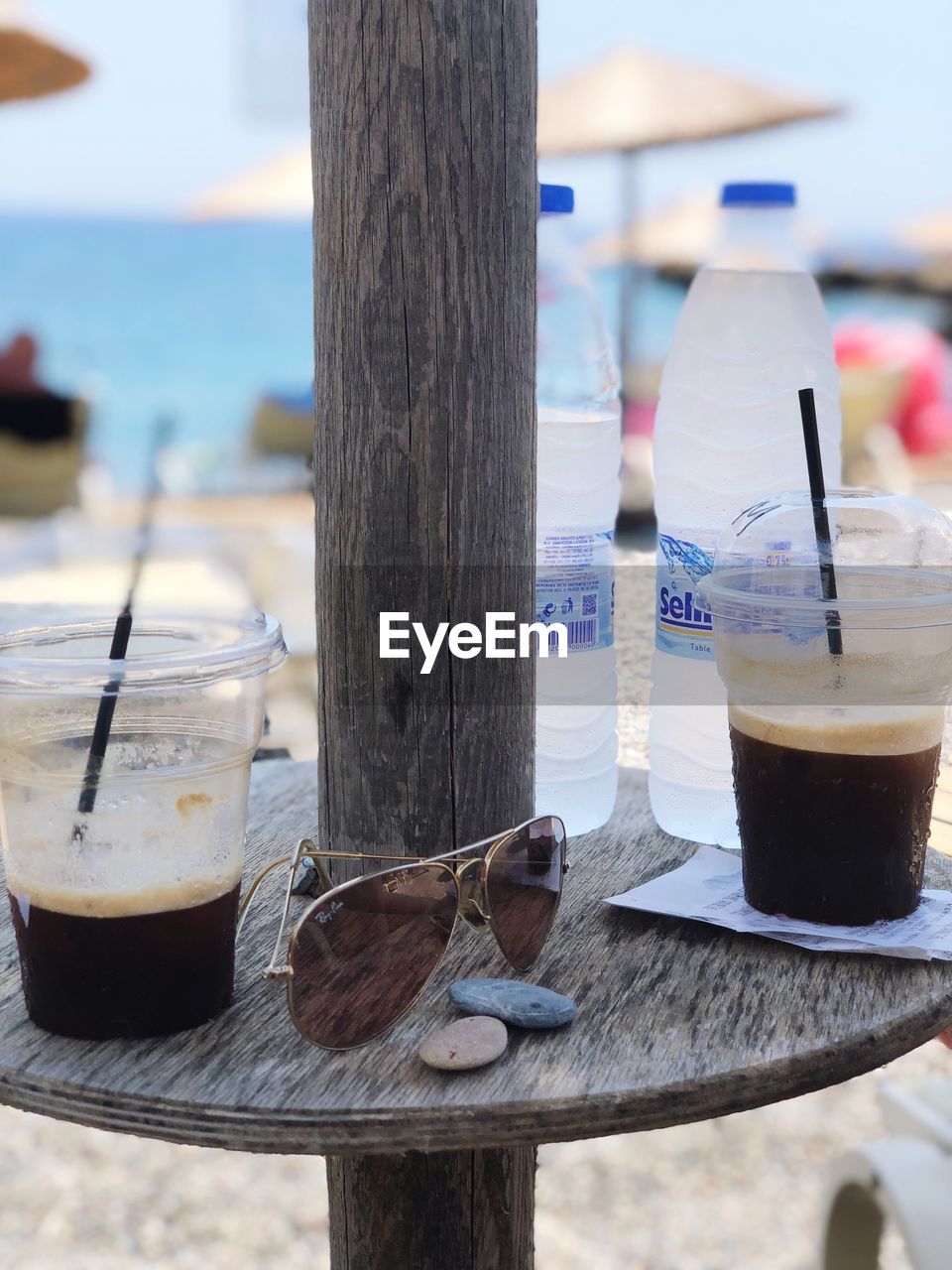 CLOSE-UP OF DRINK ON TABLE