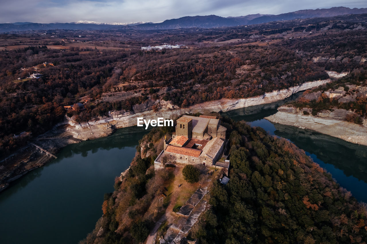 High angle view of town against cloudy sky