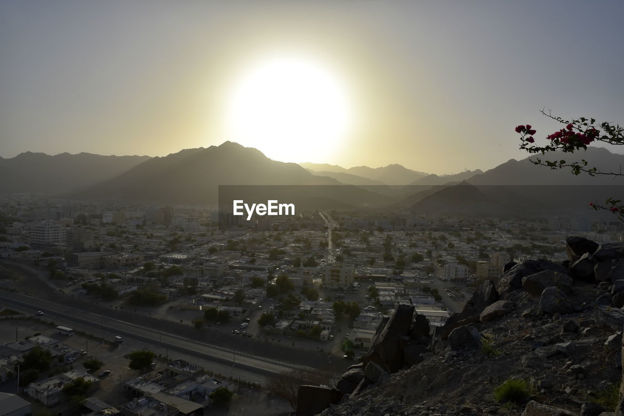 AERIAL VIEW OF CITY AGAINST SKY