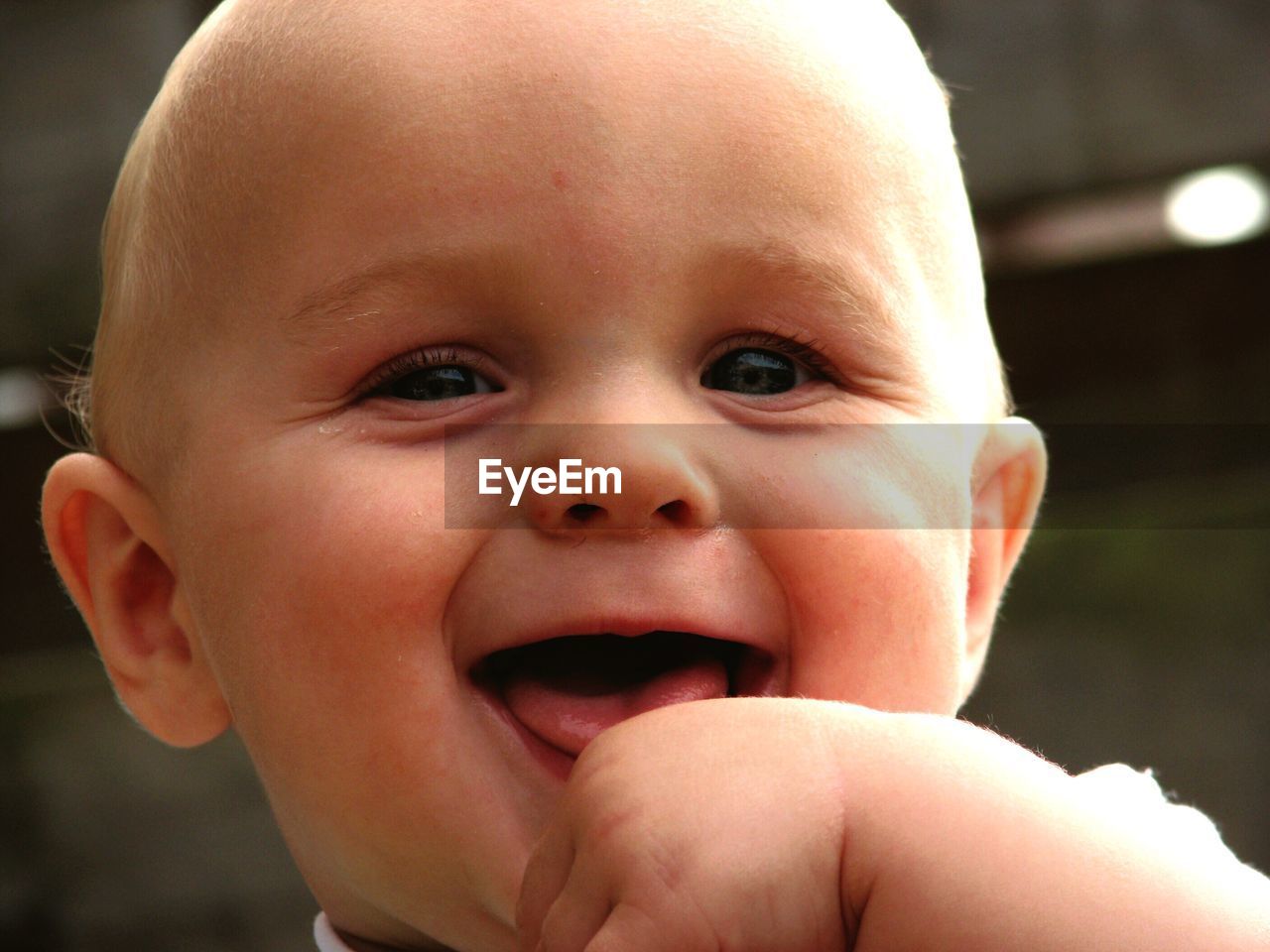 Close-up portrait of happy baby boy