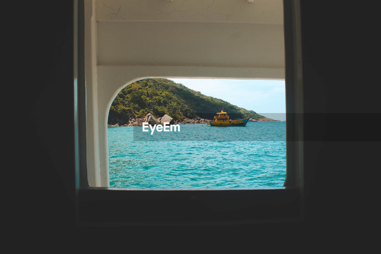 Sea seen through boat window