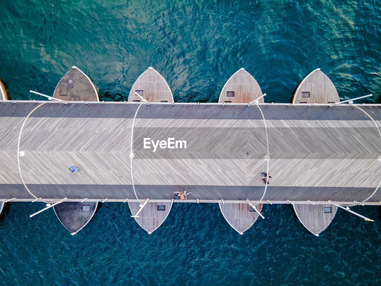 HIGH ANGLE VIEW OF SWIMMING POOL AT SEA