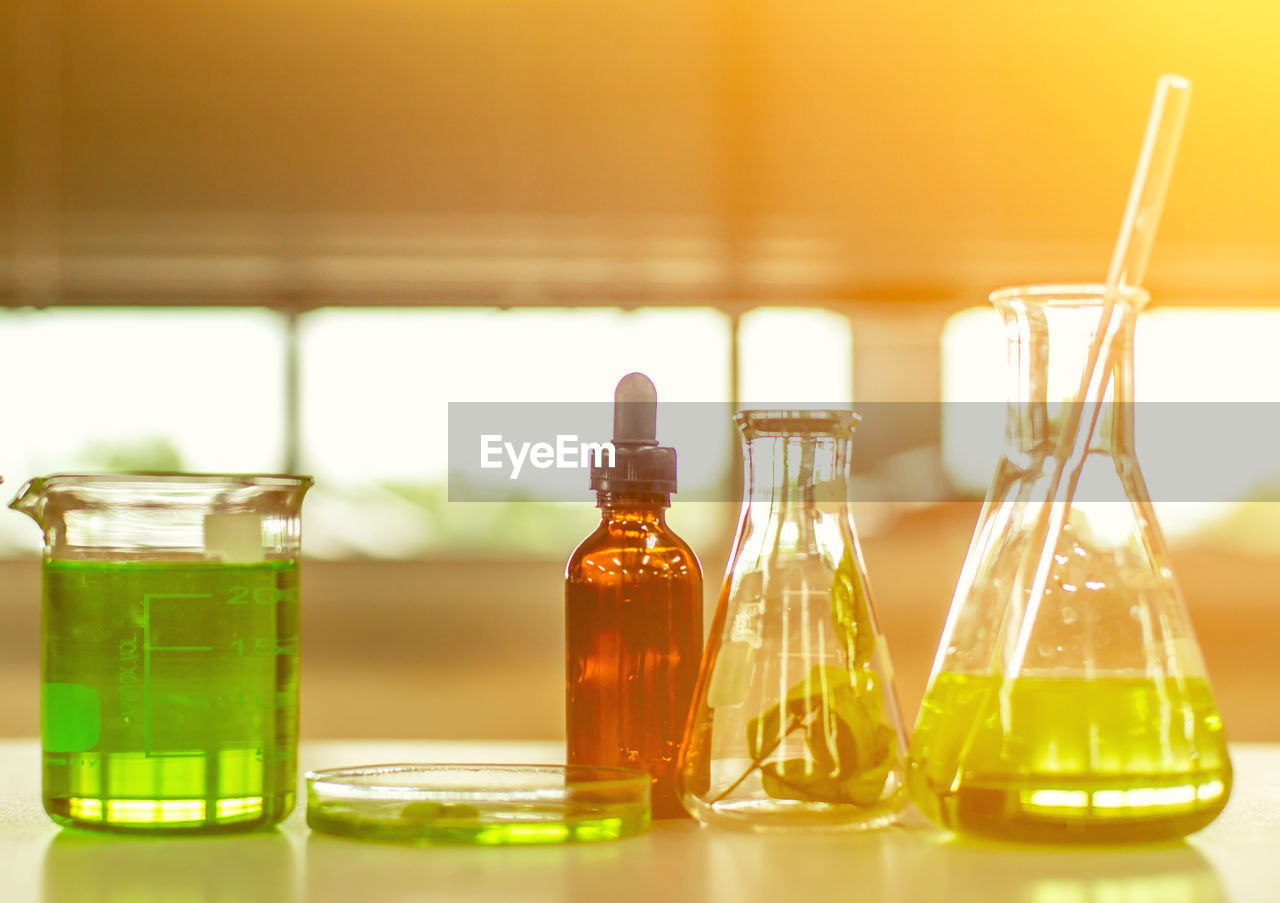 Close-up of laboratory glassware on table