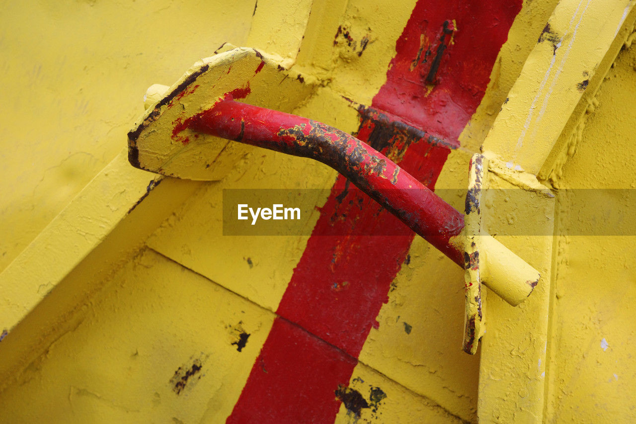 yellow, red, wall, metal, floor, no people, wall - building feature, architecture, old, close-up, paint, full frame, outdoors