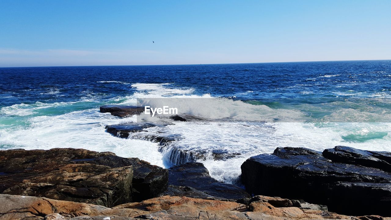 View of sea from rocky beach