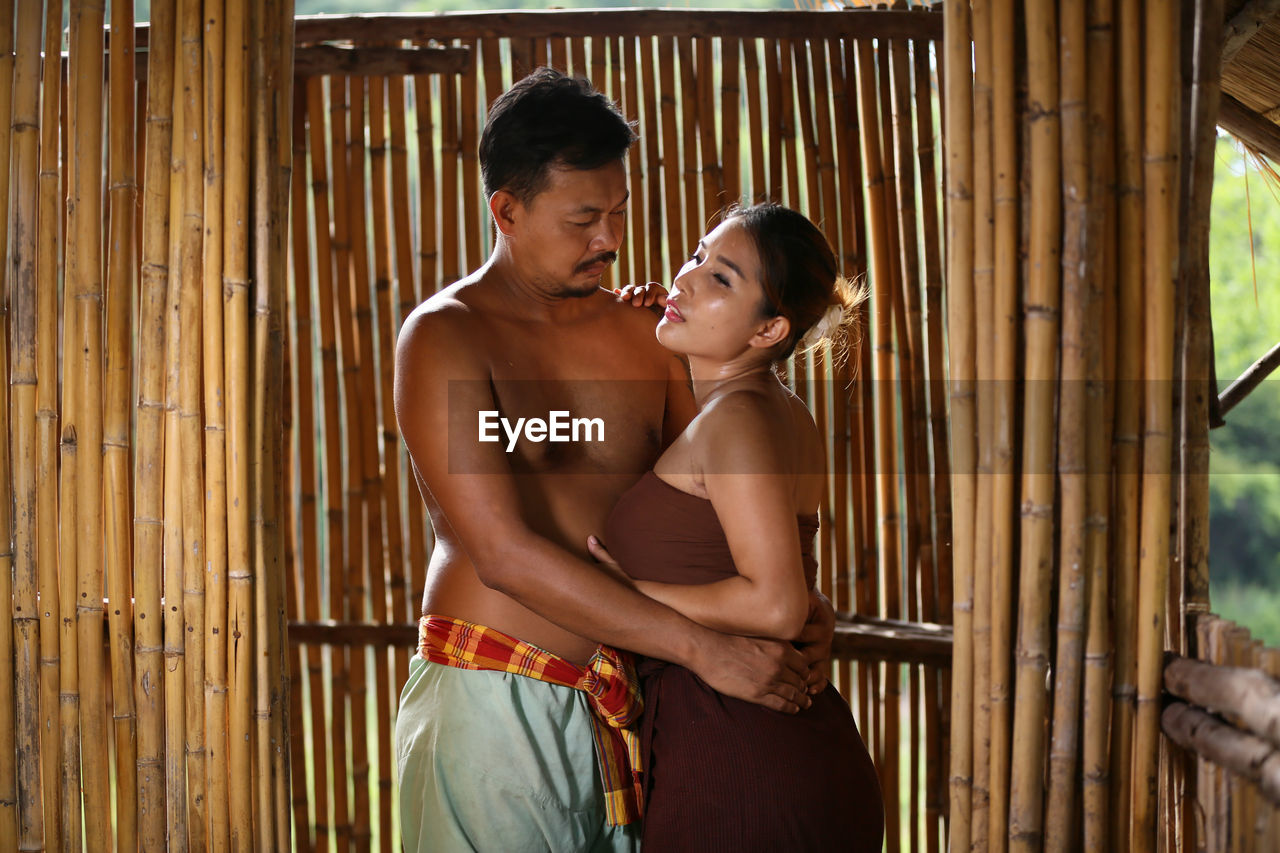 Young couple standing outdoors