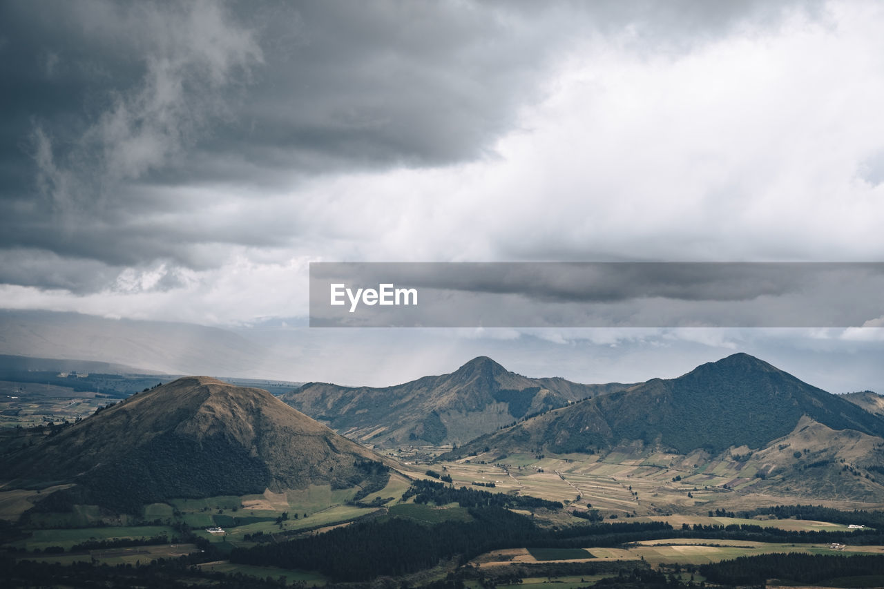 SCENIC VIEW OF DRAMATIC SKY OVER LANDSCAPE