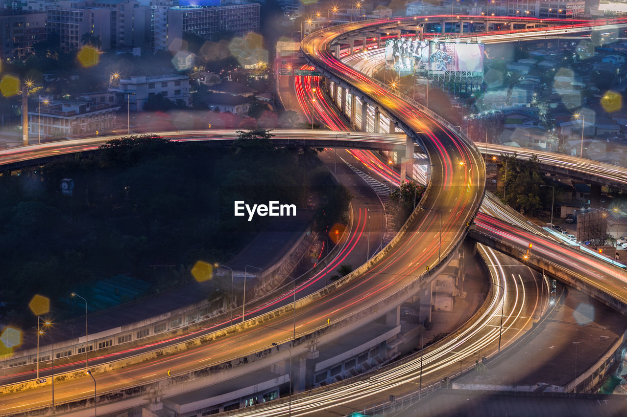 High angle view of light trails on road in city