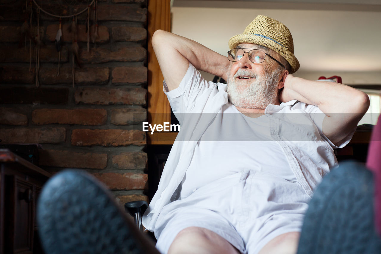 Portrait of man wearing hat