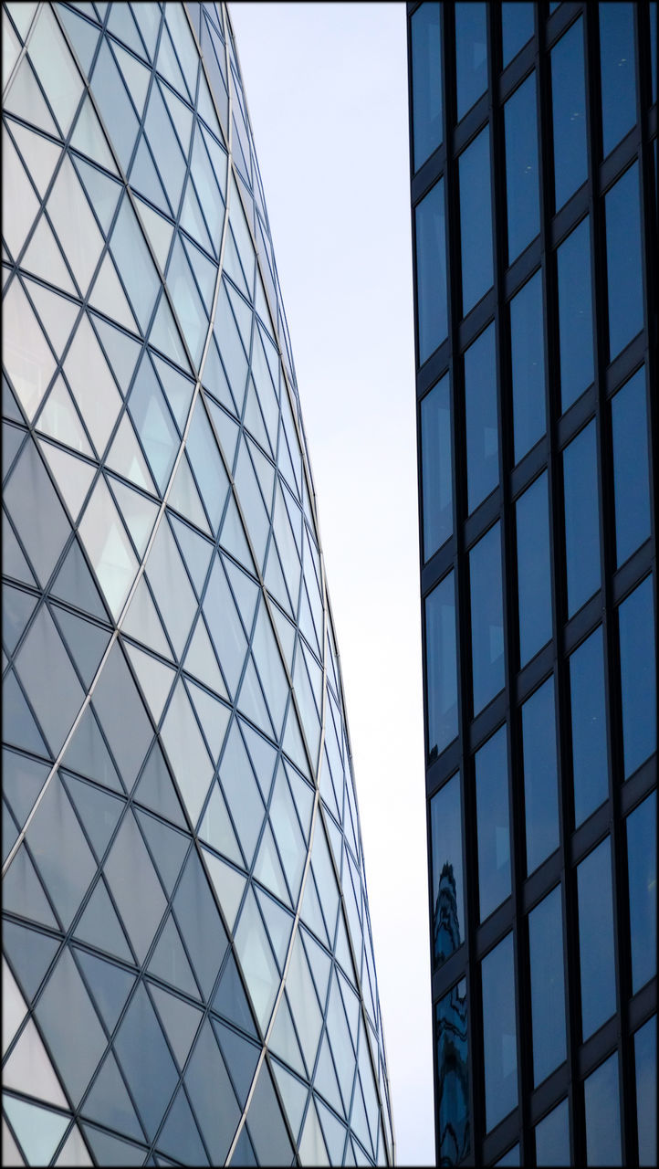 LOW ANGLE VIEW OF MODERN BUILDINGS