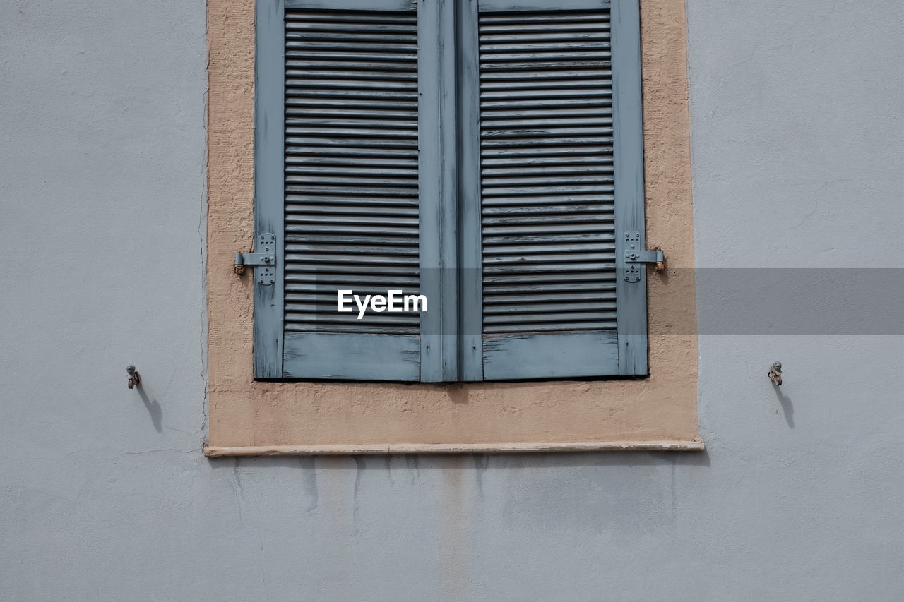 Low angle view of closed window