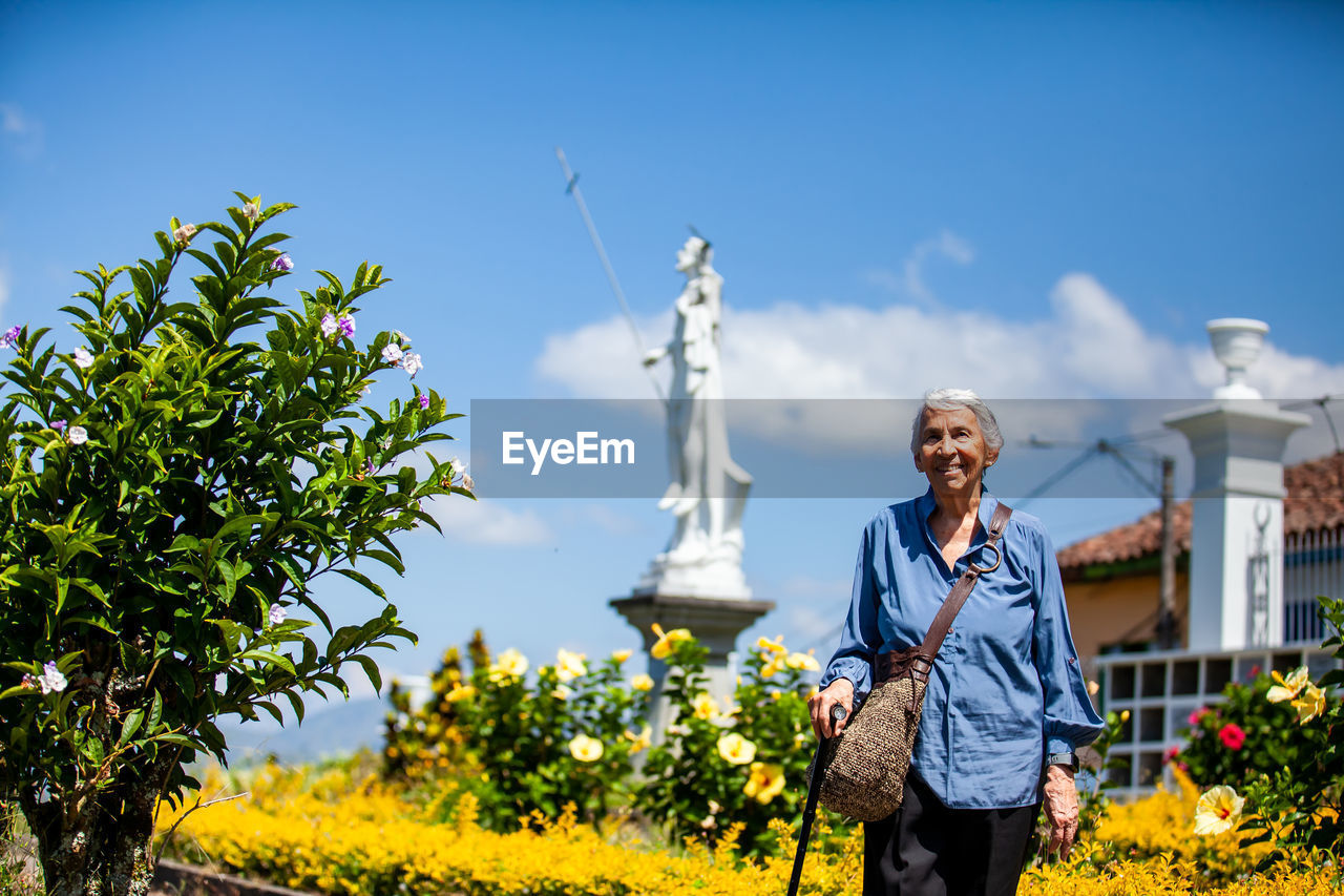 Senior woman tourist at the heritage town of salamina in the department of caldas in colombia