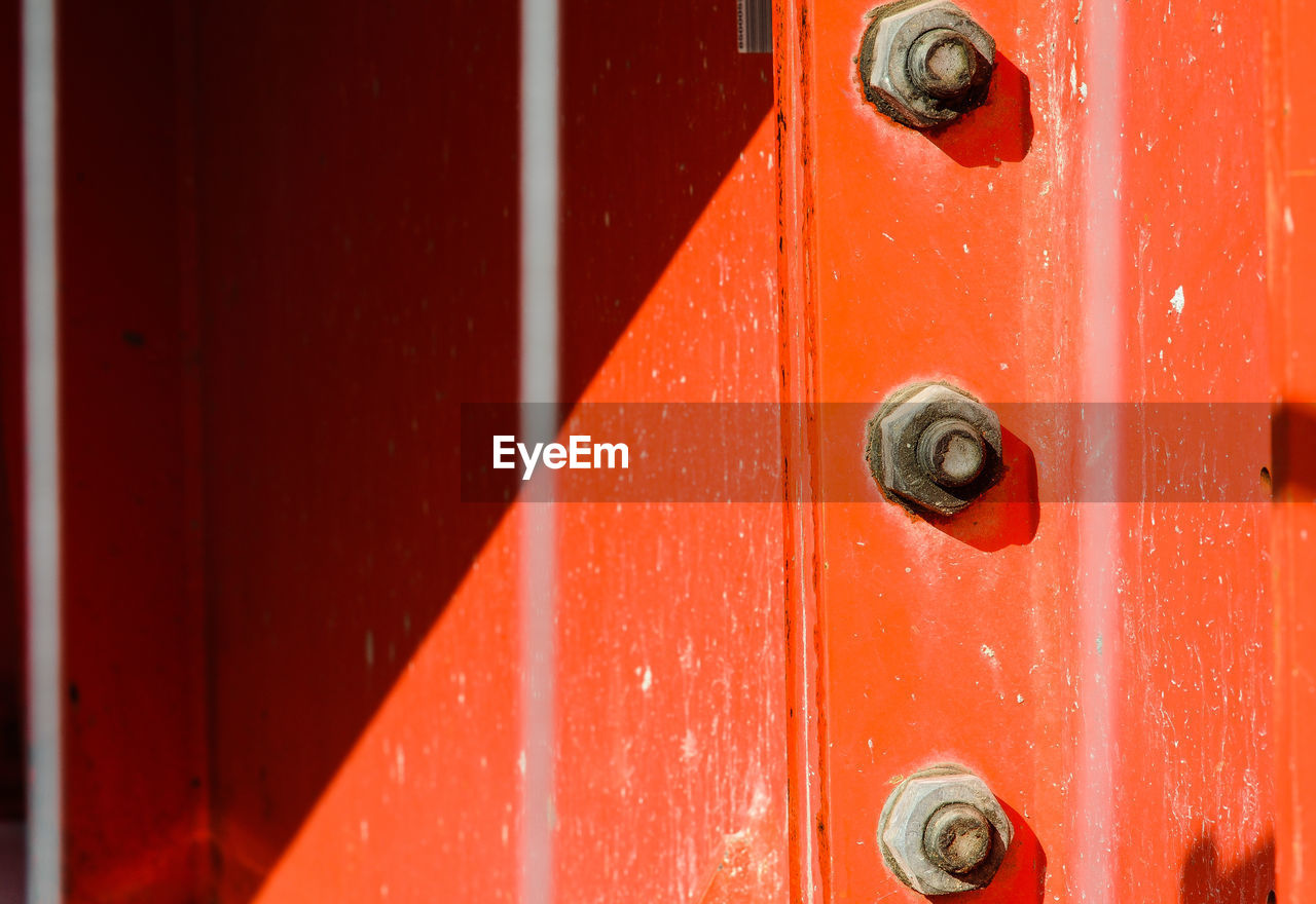 red, door, entrance, security, protection, wood, close-up, closed, metal, lock, full frame, no people, backgrounds, day, knob, handle, keyhole, doorknob, bolt, outdoors, old, orange color, door handle, sunlight, pattern