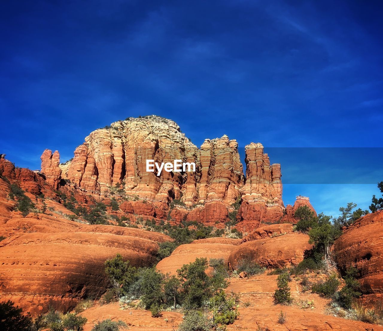 Rock formations on mountain against sky