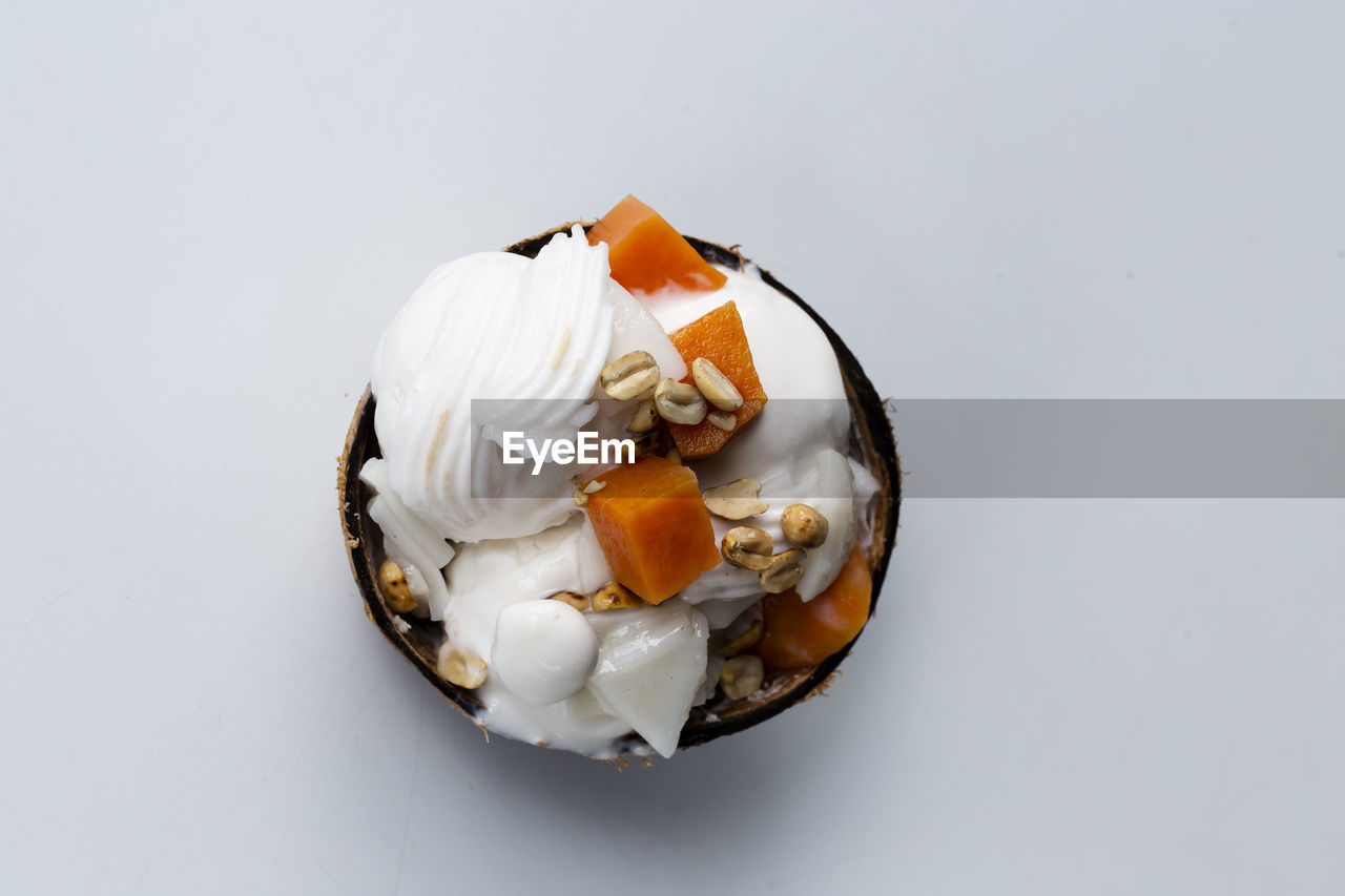 food and drink, food, studio shot, indoors, white background, ice cream, sweet food, sweet, no people, produce, cut out, dessert, healthy eating, freshness, shell, single object, high angle view, dairy, dish, sundae, frozen food, egg, frozen