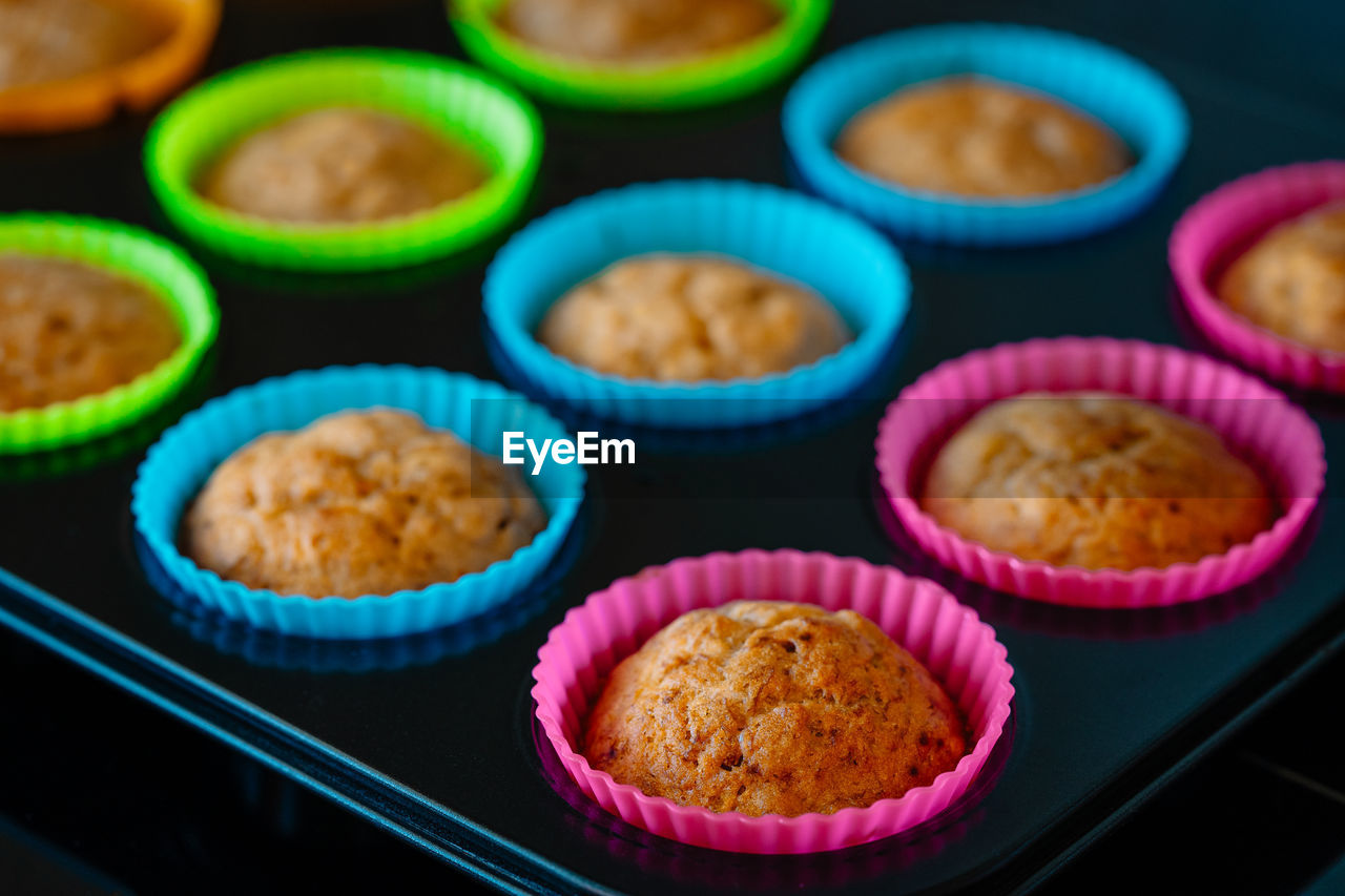 Muffins in colorful silicone trays