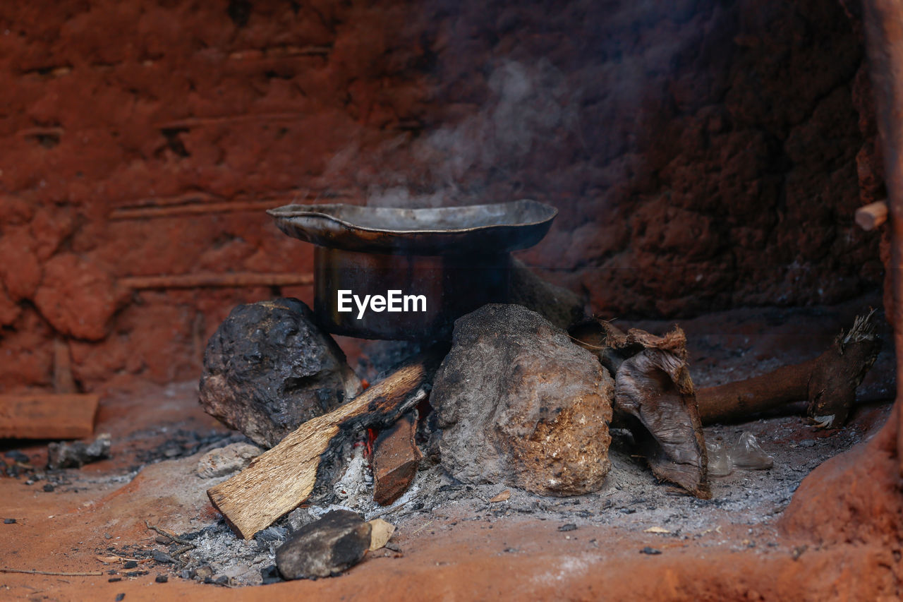 African cooking with firewood and three stones. 