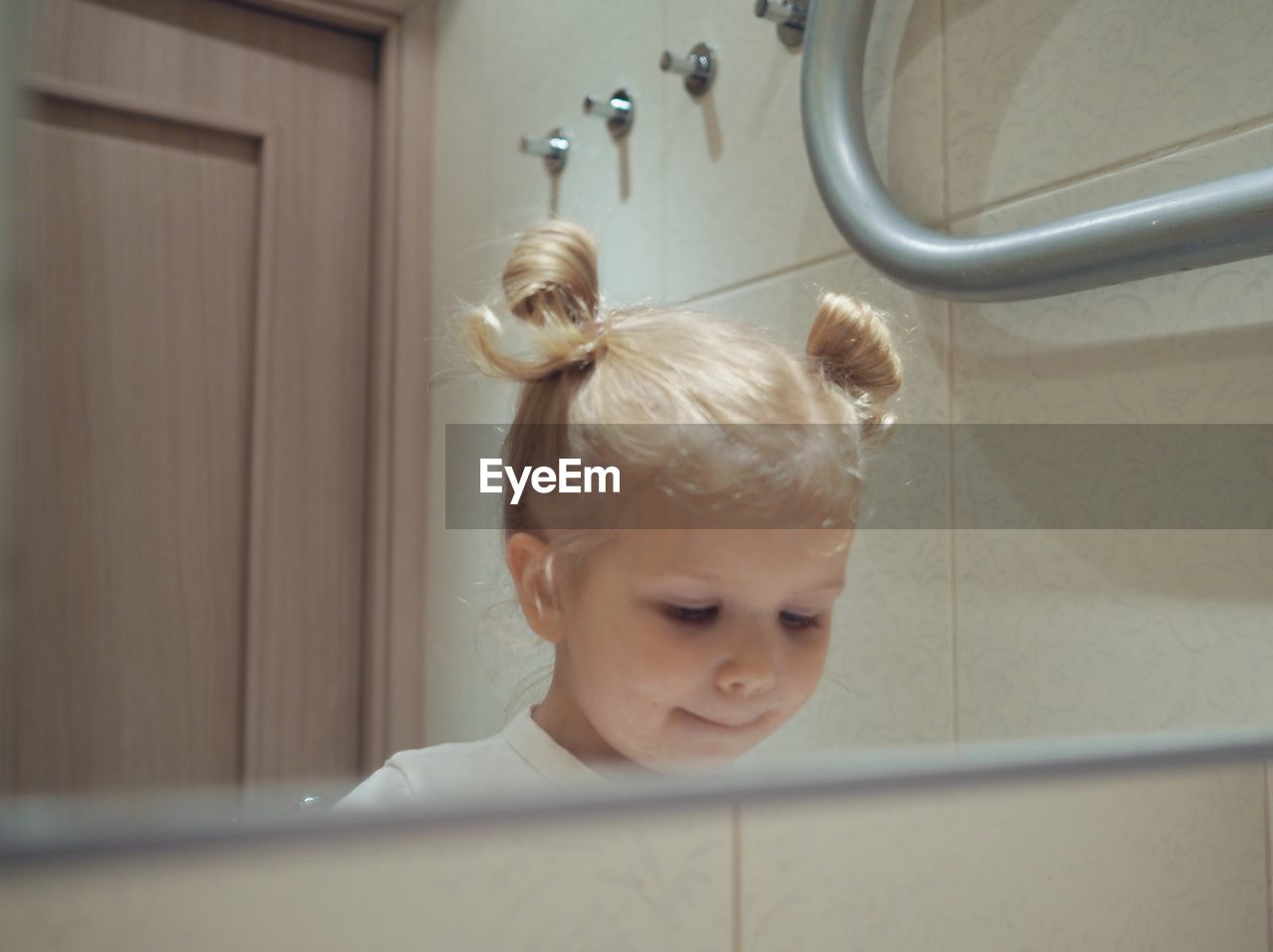 Portrait of cute boy in bathroom