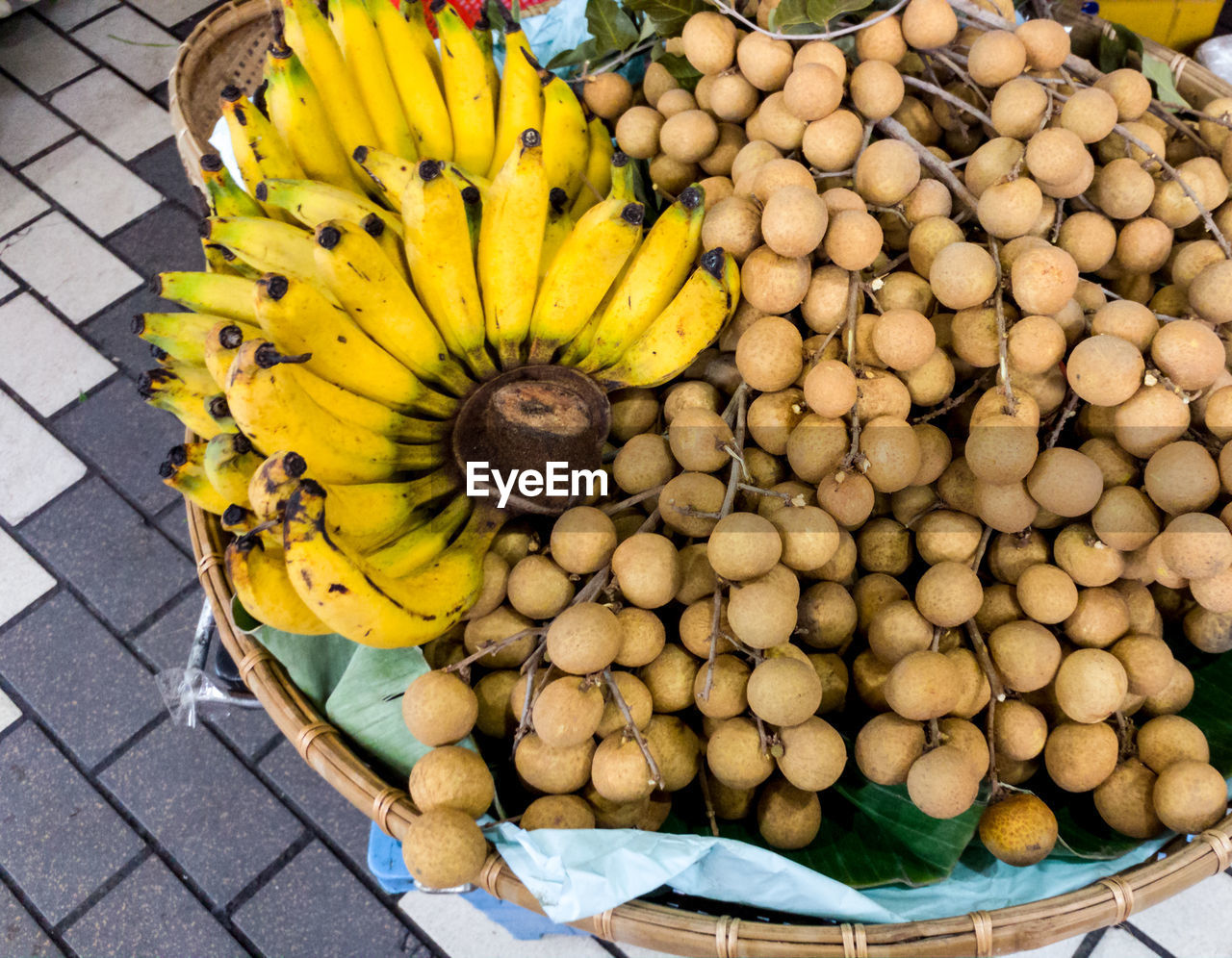 HIGH ANGLE VIEW OF FRUITS IN MARKET AT STALL