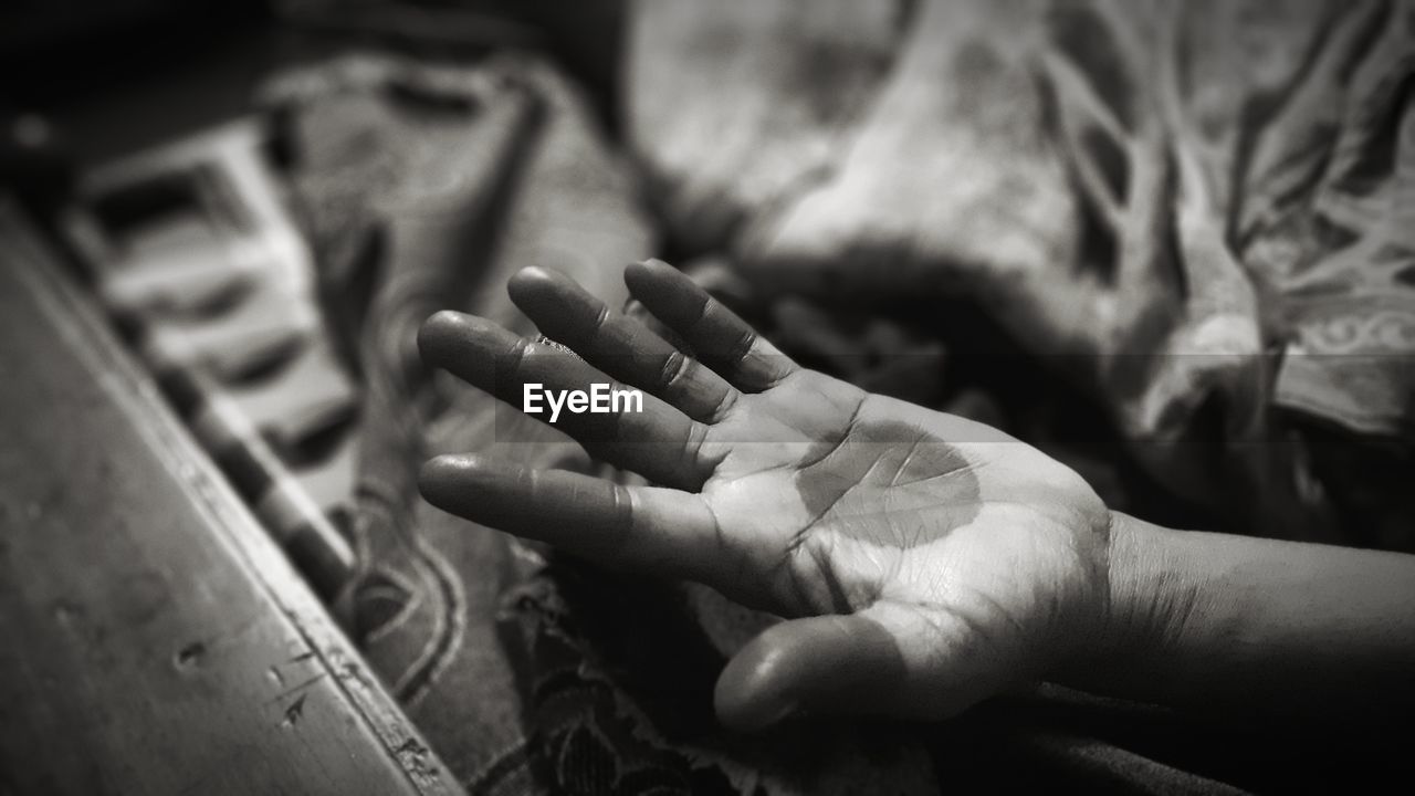 Close-up of person hand with henna tattoo