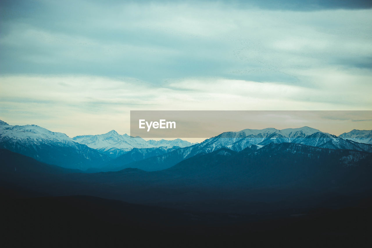 Mountains with snow , summit, ridge