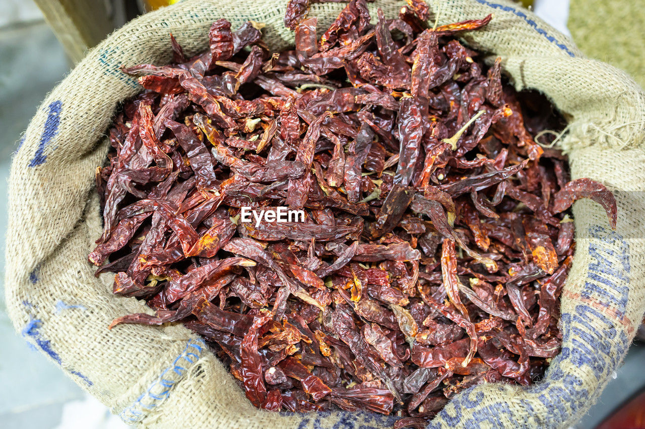 Dry red chilli spice for sale at retail shop from top angle at day