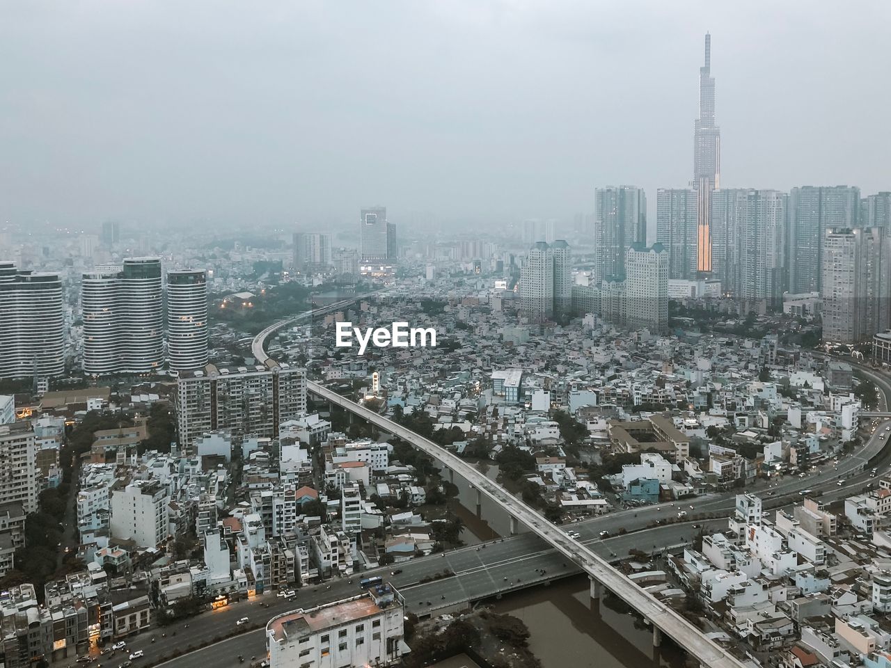 High angle view of modern buildings in city against sky