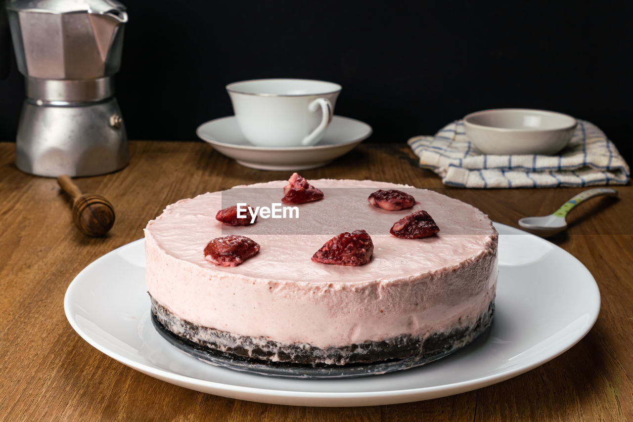 Close-up of cake served on table