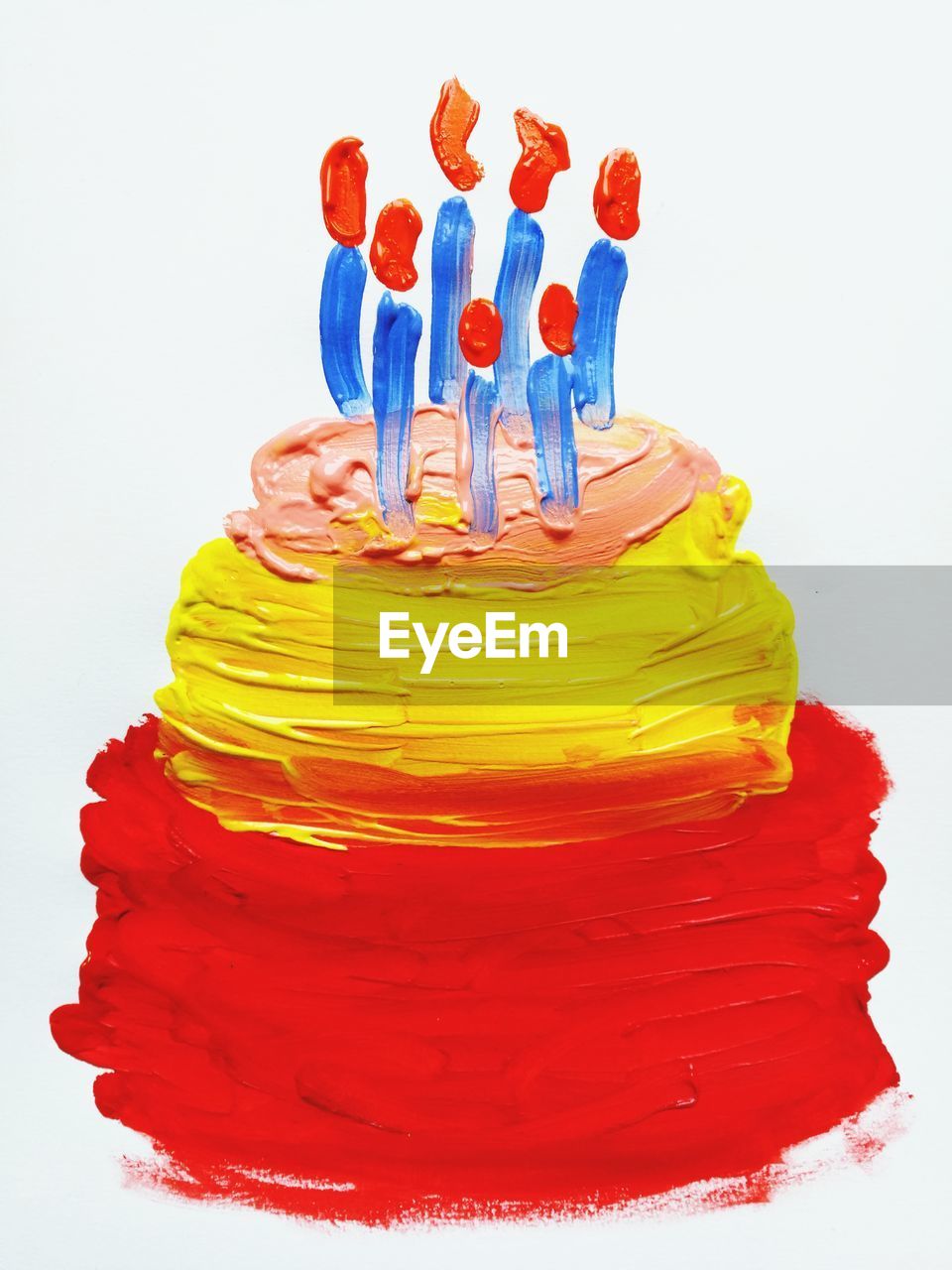 CLOSE-UP OF MULTI COLORED CANDIES OVER WHITE BACKGROUND