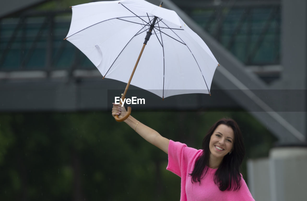 young woman with umbrella