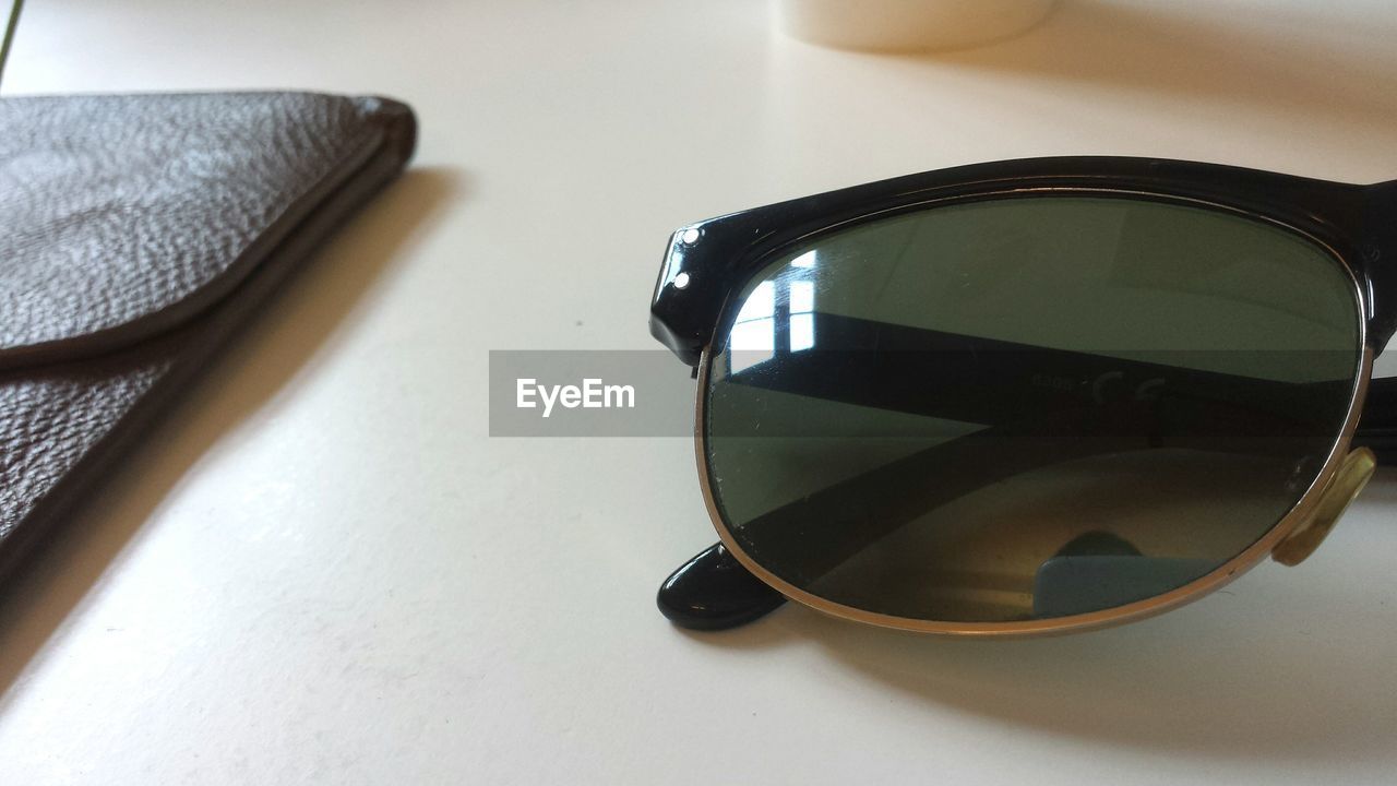 Close-up of sunglasses on table