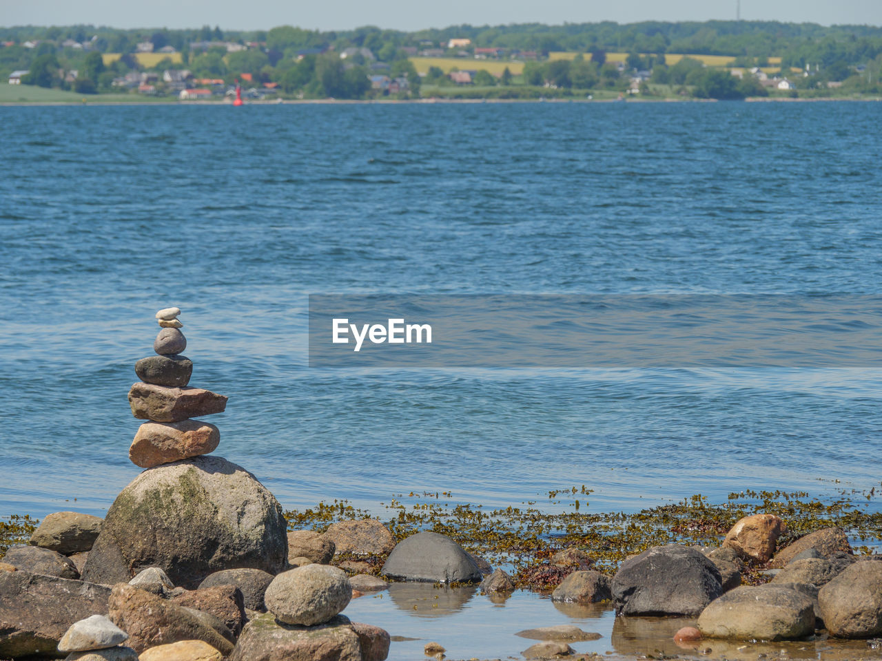 STACK OF ROCKS ON SHORE