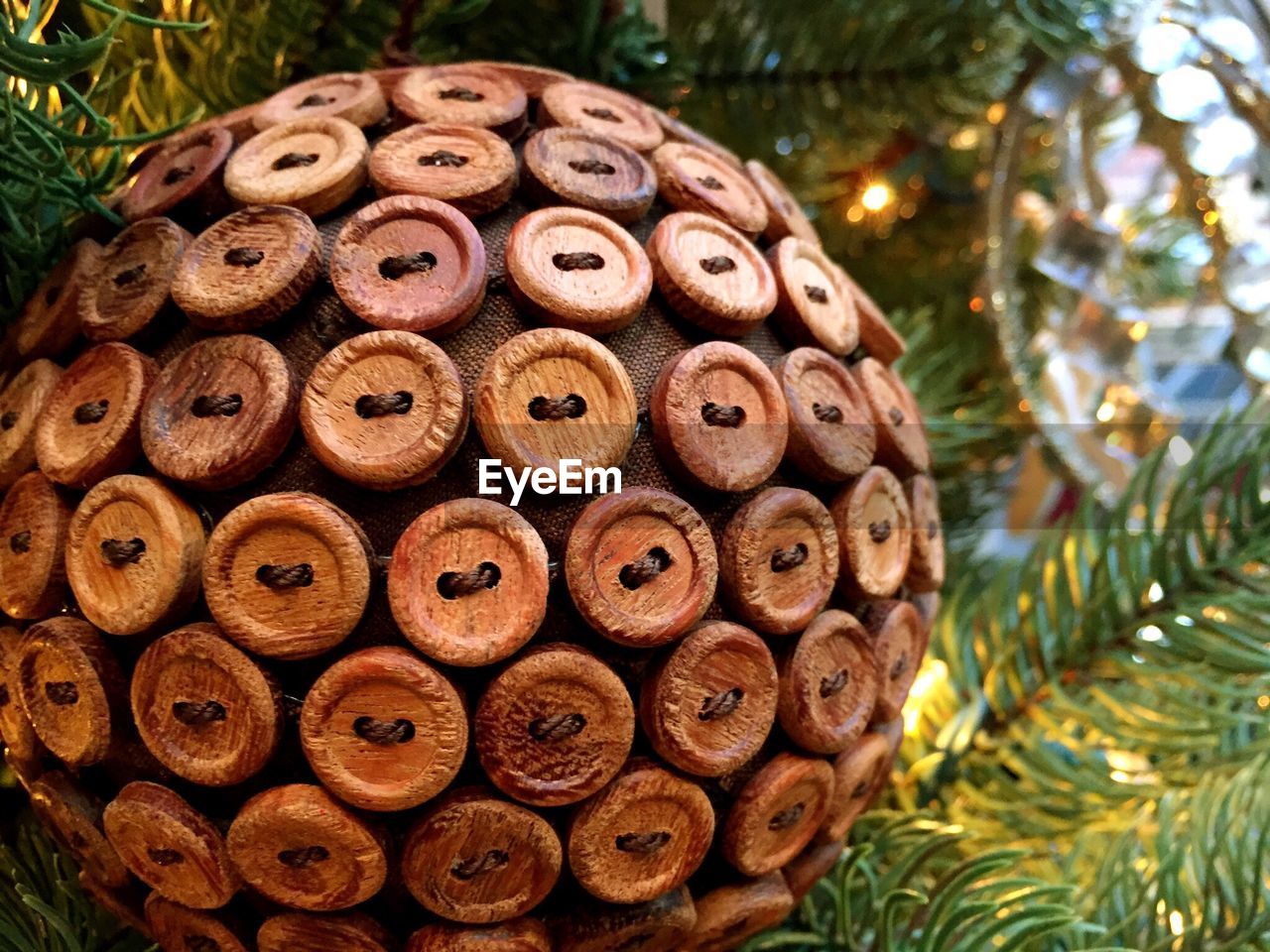 Close-up of brown bauble on christmas tree