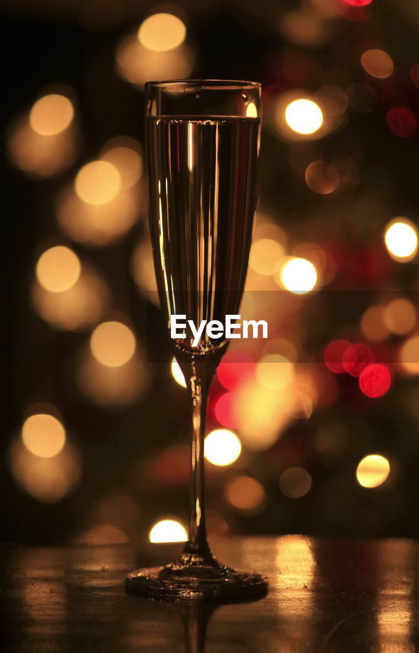 Close-up of champagne flute on table