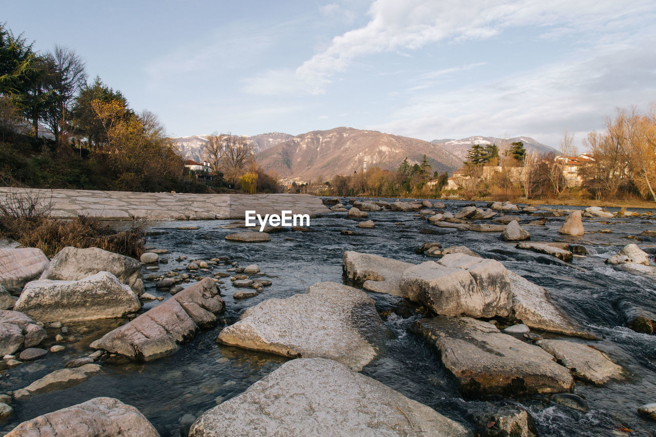 Scenic view of landscape and mountains against sky