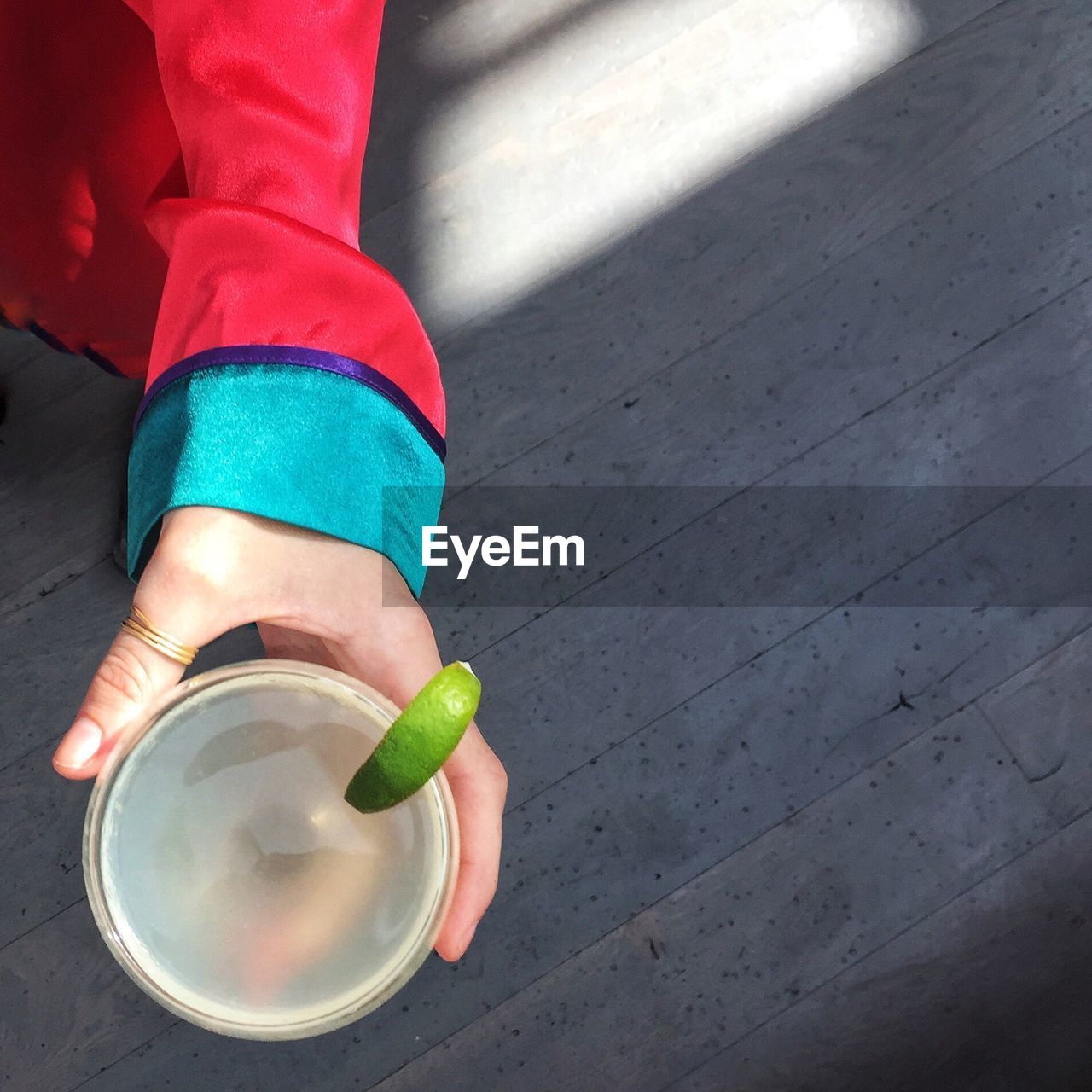 LOW SECTION OF BOY HOLDING LEAF WITH LEGS