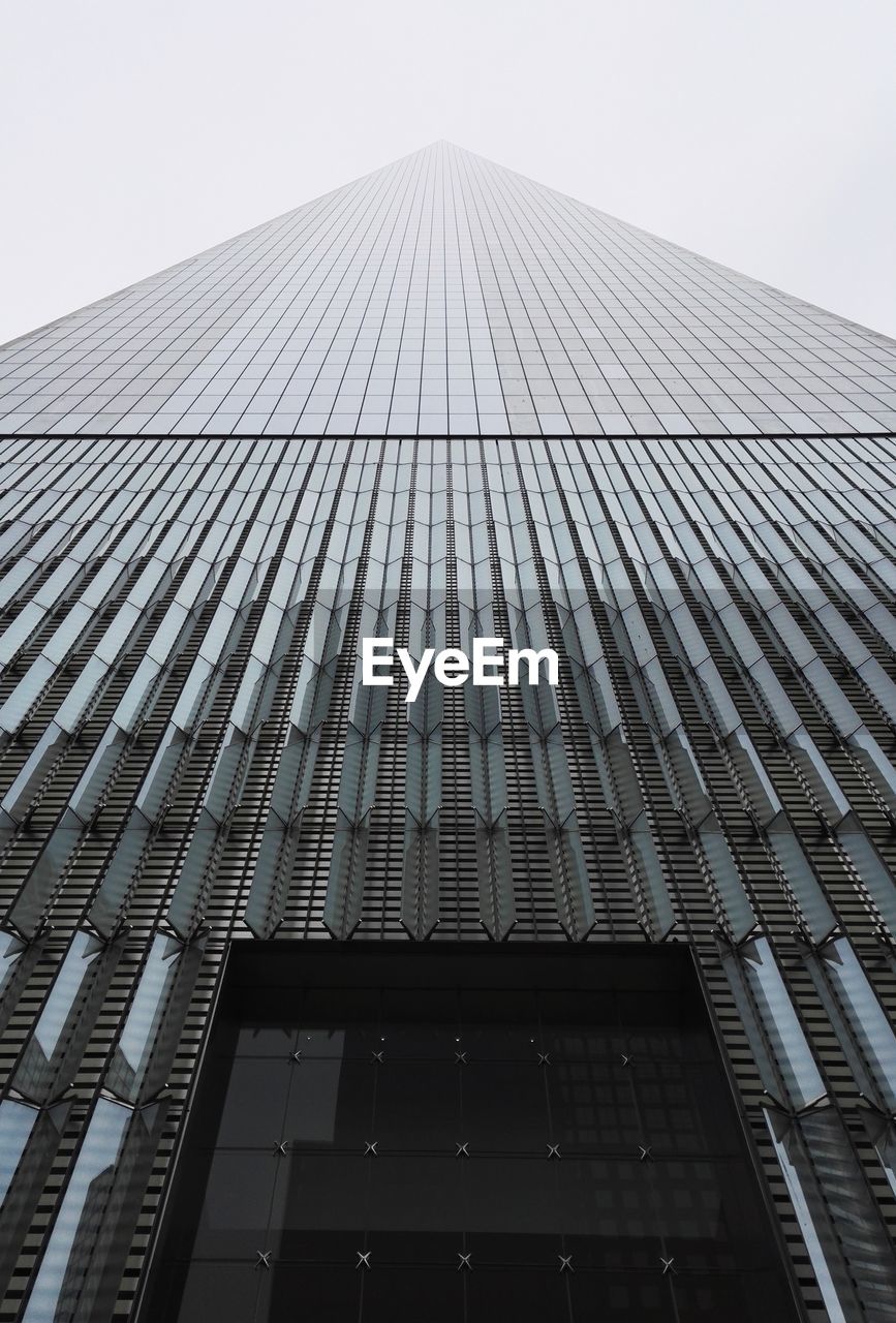 LOW ANGLE VIEW OF MODERN BUILDINGS AGAINST SKY