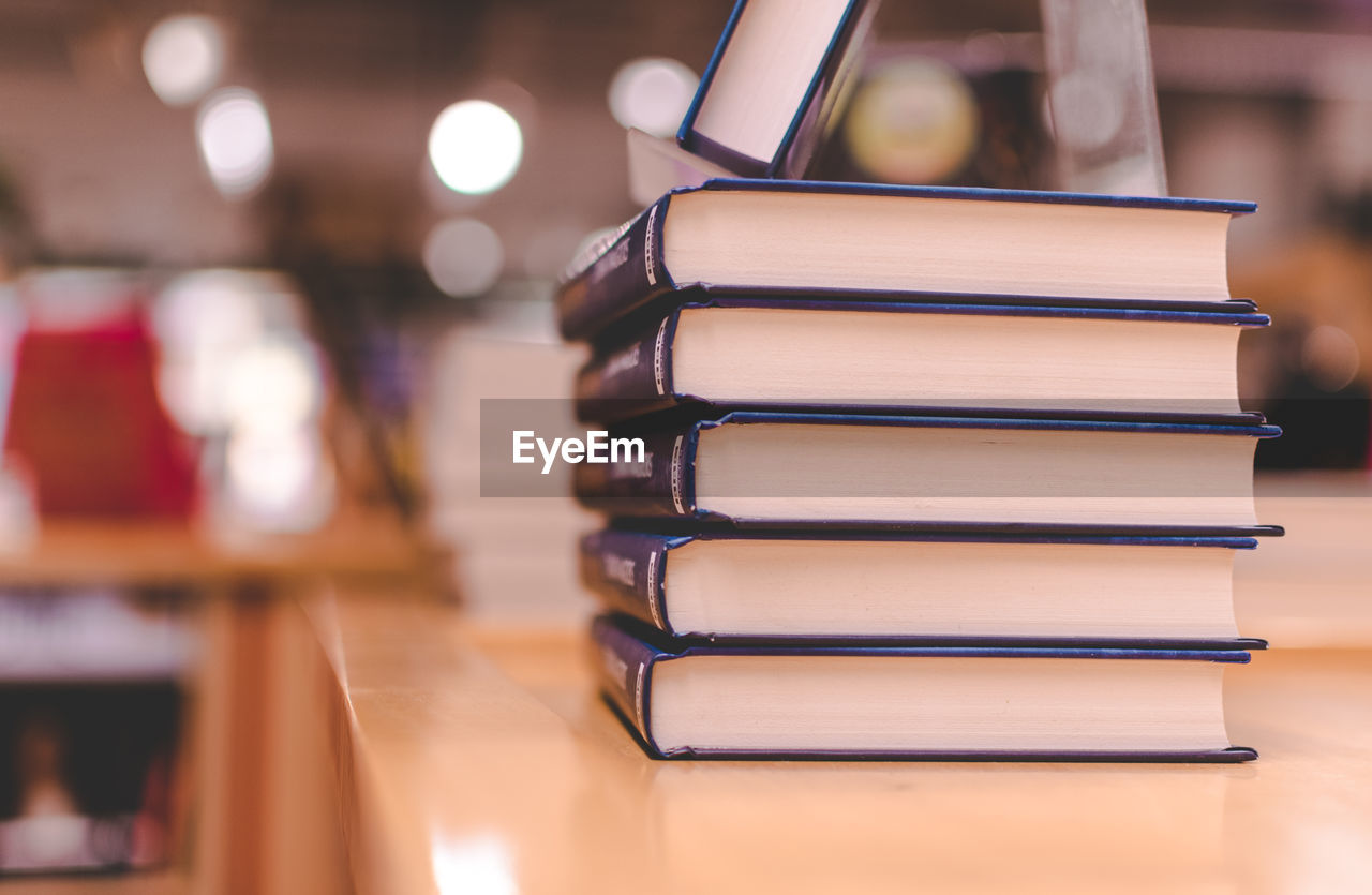 Stack of books on table