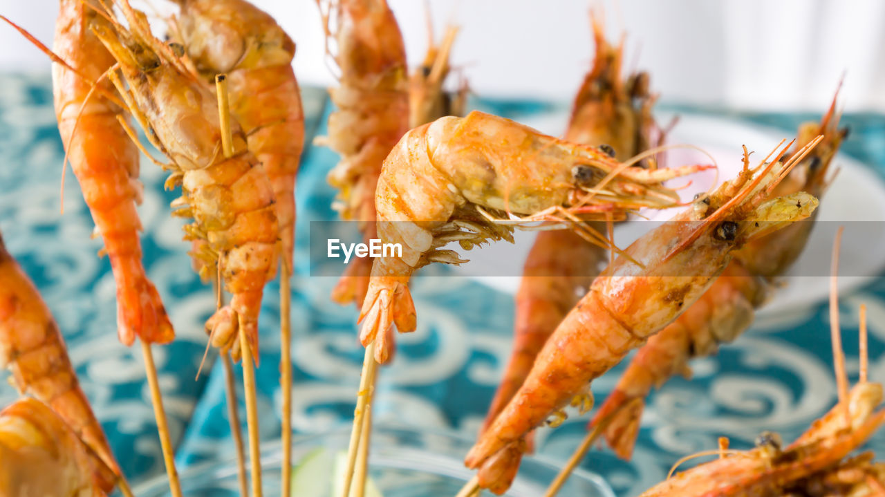 Close-up of fried prawn on table