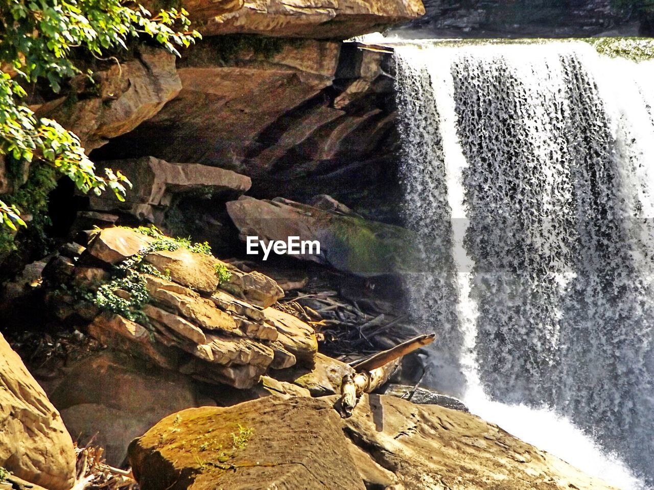 SCENIC VIEW OF WATERFALL