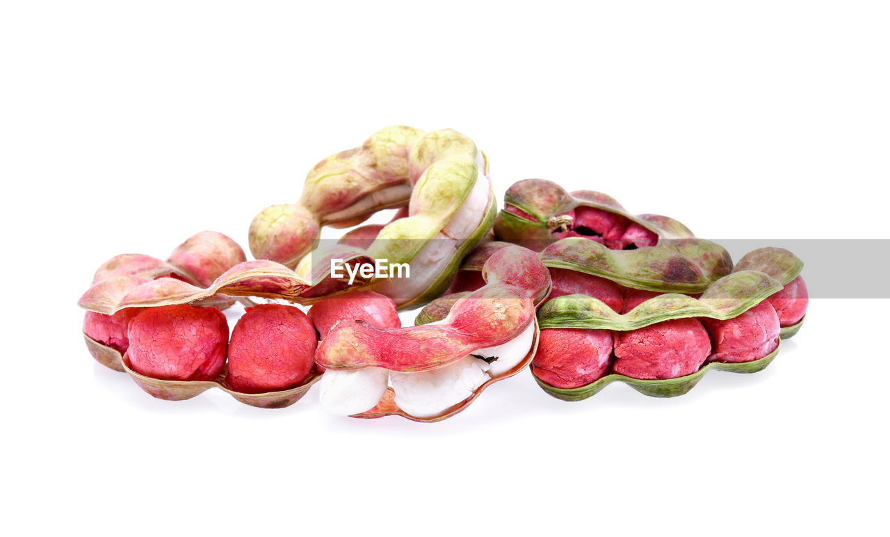 Close-up of fruits against white background