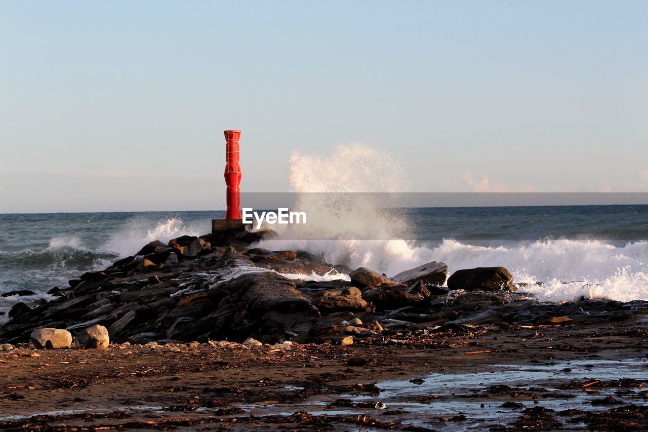 Scenic view of sea against clear sky