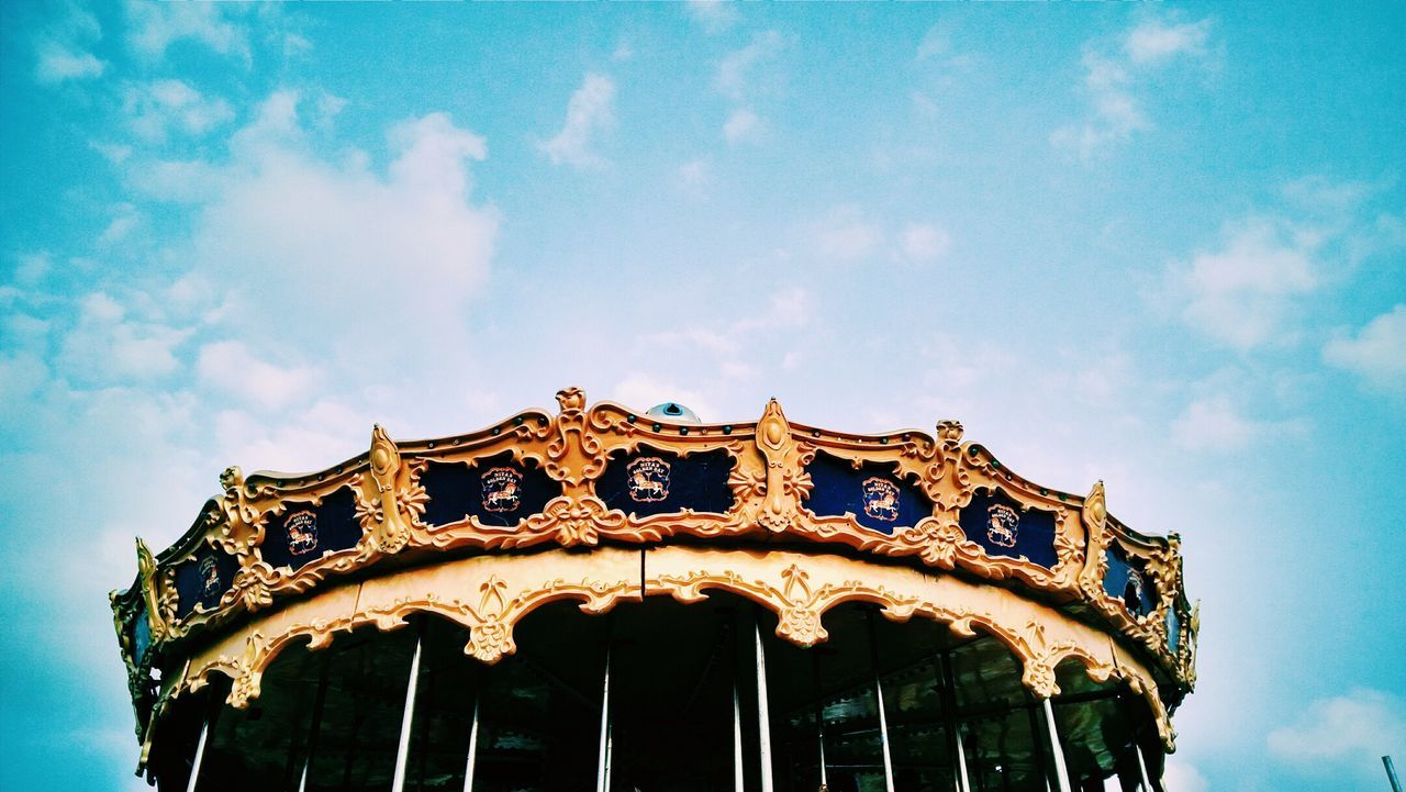 Low angle view of building against blue sky