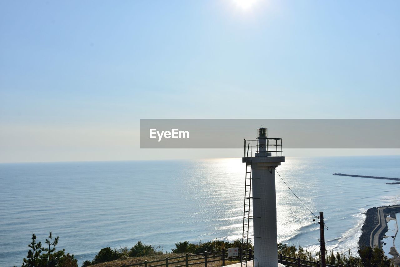 Scenic view of sea against sky on sunny day