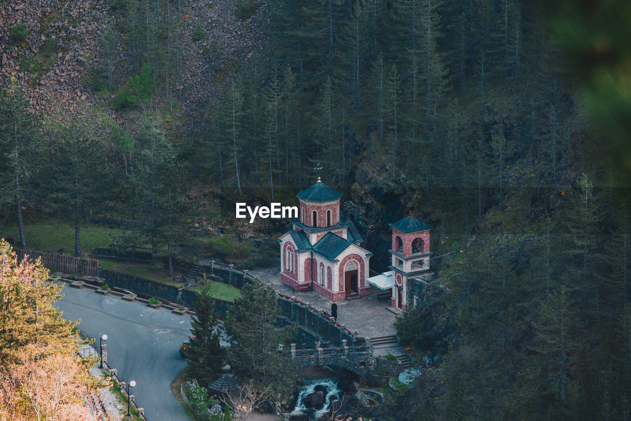 tree, plant, architecture, built structure, nature, water, forest, building exterior, land, no people, high angle view, building, travel destinations, travel, religion, outdoors, landscape, scenics - nature, tourism, beauty in nature, place of worship, day, history, environment, river, mountain, tranquility, the past