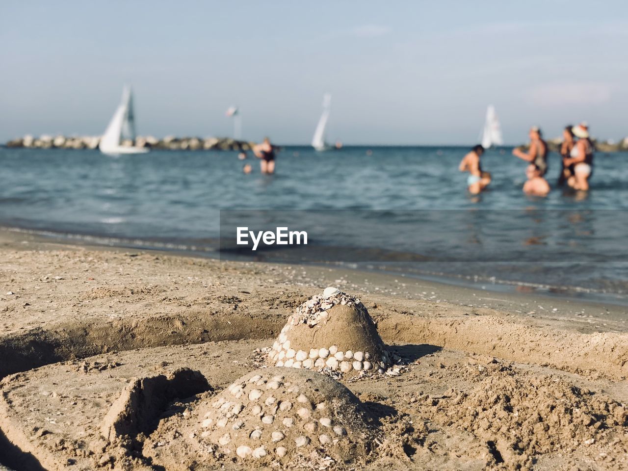 Scenic view of sandcastle and sea