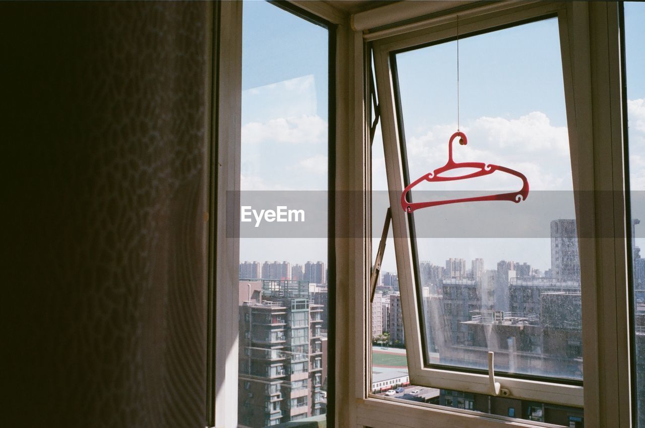 View of city through window