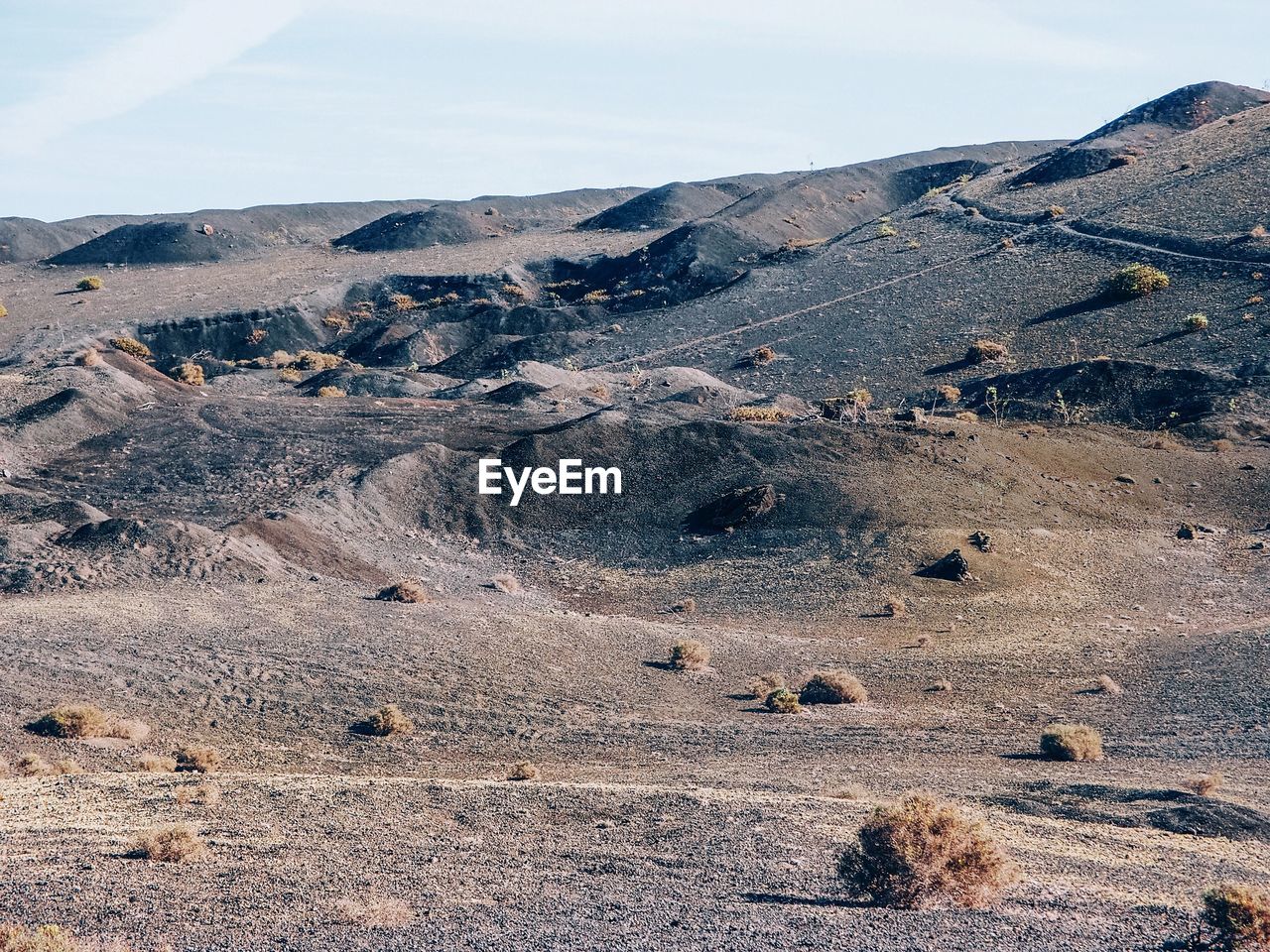 Scenic view of the volcanic landscape in timanfaya national park. lanzarote, canary islands